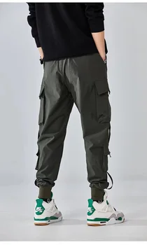 Мужские брюки с боковым карманом и завязками на талии